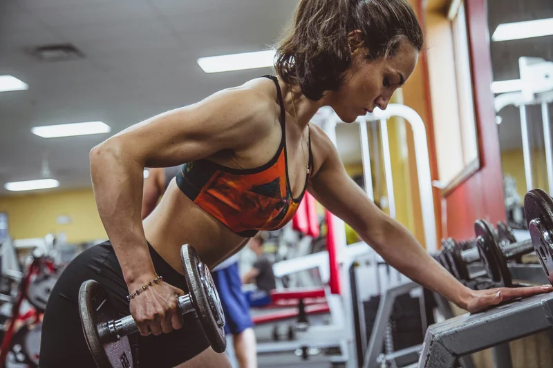 Woman doing weight bearing exercise for bone health and osteoporosis prevention