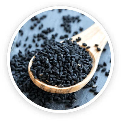 Babchi Psoralea corylifolia black seeds on a spoon